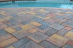 Pool Decking with Brick Pavers or Travertine Decking and Brick Paved Driveways in Sarasota, Florida